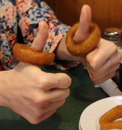 flipping onion rings on thumbs